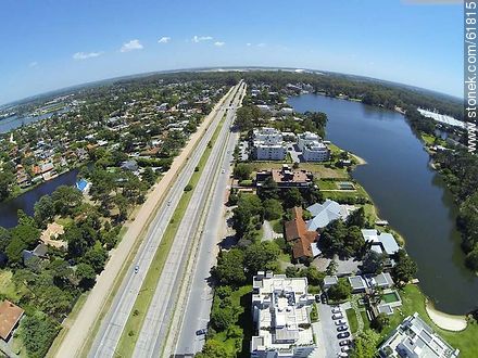 Aerial view of houses on the Avenue of the Americas and lakes - Department of Canelones - URUGUAY. Photo #61815