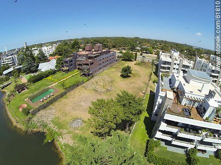 Aerial view of houses on the Avenue of the Americas and lakes - Department of Canelones - URUGUAY. Photo #61810