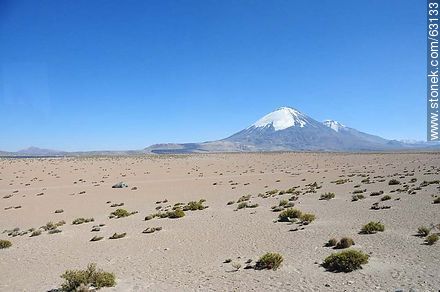 Looming volcanoes Parinacota and Pomerape - Chile - Others in SOUTH AMERICA. Photo #63133