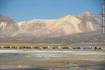 Chungará Lake. Nevados de Quimsachata. Time line of trucks waiting at the border post - Chile - Others in SOUTH AMERICA. Photo #65177