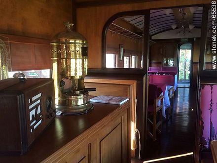 Interior of an old wagon turned-restaurant. Old radio and coffee machine - Department of Colonia - URUGUAY. Foto No. 65538