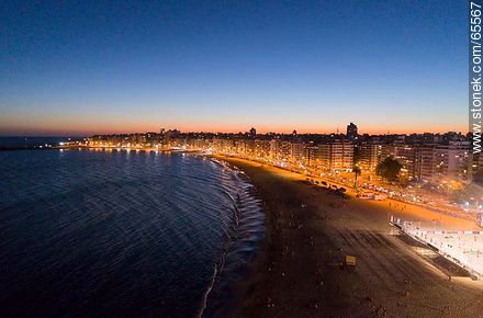 Aerial view at dusk of the rambla and beach Pocitos - Department of Montevideo - URUGUAY. Photo #65567