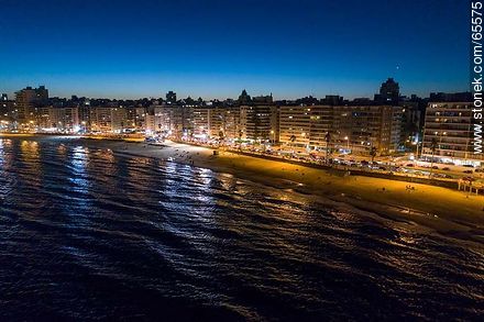 Aerial view at dusk of the rambla and beach Pocitos - Department of Montevideo - URUGUAY. Foto No. 65575