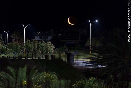 Moon in growing quarter poking at night - Department of Maldonado - URUGUAY. Photo #65716