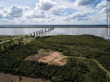 Aerial view of the Gral. San Martín bridge linking Fray Bentos (UY) and Puerto Unzué (AR) - Rio Negro - URUGUAY. Photo #66061