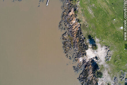 Aerial zenithal view of the rocks of Buceo beach -  - MORE IMAGES. Photo #67782