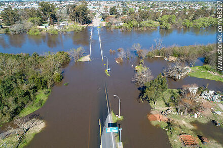 Aerial view of the Santa Lucia River overflowing covering the old Route 11 - Department of Canelones - URUGUAY. Photo #68327