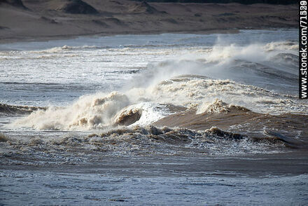 Surf with foam in turbid sea - Department of Maldonado - URUGUAY. Photo #71200