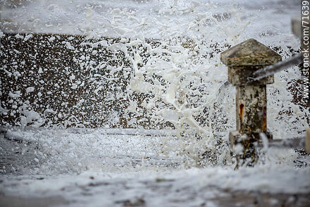 Foam breaking on the access stairs to the beach - Department of Maldonado - URUGUAY. Photo #71639