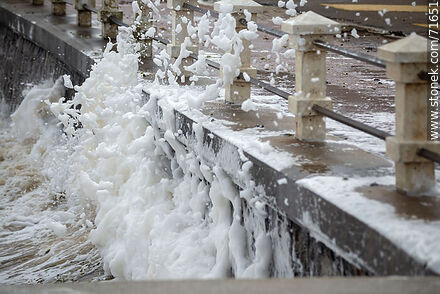 Foam breaking over the sea wall and splashing the promenade - Department of Maldonado - URUGUAY. Photo #71651