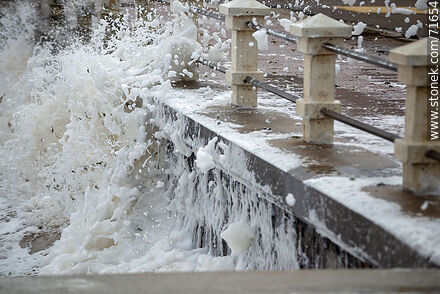 Foam breaking over the sea wall and splashing the promenade - Department of Maldonado - URUGUAY. Photo #71654