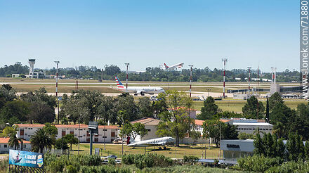 Air Base No. 1, former DC-3 / C-47 on display and Gol plane taking off - Department of Canelones - URUGUAY. Photo #71880