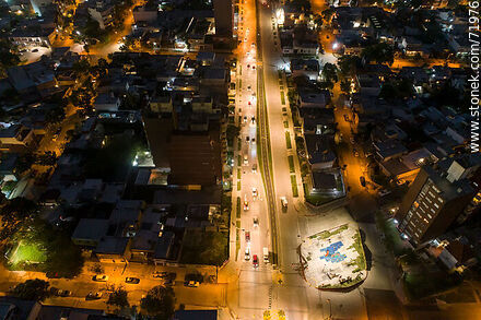 Aerial night view of the Miguel Hernandez plaza over L. A. de Herrera Ave. - Department of Montevideo - URUGUAY. Photo #71976