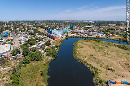 Aerial view of the Pantanoso stream and the PTI Cerro - Department of Montevideo - URUGUAY. Photo #72014
