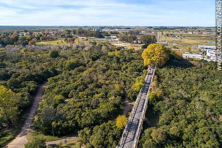 Aerial view of the access bridge to the capital city crossing the Santa Lucia River in autumn - Department of Florida - URUGUAY. Photo #72485