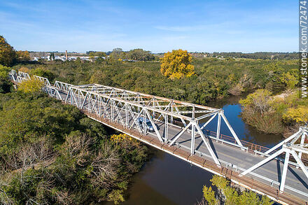 Aerial view of the access bridge to the capital city across the Santa Lucia River in autumn. - Department of Florida - URUGUAY. Photo #72474