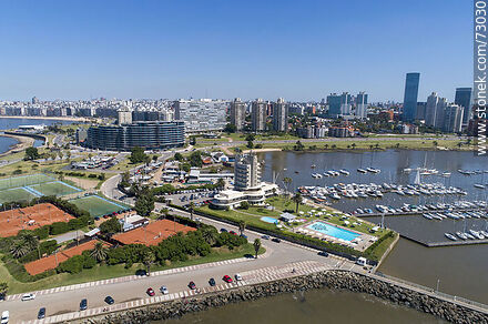 Vista aérea de las canchas de fútbol y tenis, piscina y edificio del Yatch Club - Departamento de Montevideo - URUGUAY. Foto No. 73030
