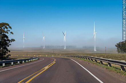 Wind turbines emerging from the morning fog near the Pampa station on Route 5. - Tacuarembo - URUGUAY. Photo #74100