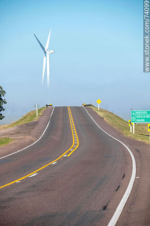 Wind turbines emerging from the morning fog near the Pampa station on Route 5. - Tacuarembo - URUGUAY. Photo #74099