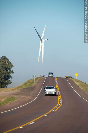 Wind turbines emerging from the morning fog near the Pampa station on Route 5 - Tacuarembo - URUGUAY. Photo #74096