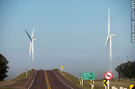 Wind turbines emerging from the morning fog near the Pampa station on Route 5. - Tacuarembo - URUGUAY. Photo #74095