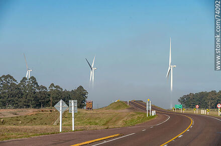 Wind turbines emerging from the morning fog near the Pampa station on Route 5. - Tacuarembo - URUGUAY. Photo #74092