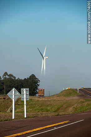 Wind turbines emerging from the morning fog near the Pampa station on Route 5. - Tacuarembo - URUGUAY. Photo #74091