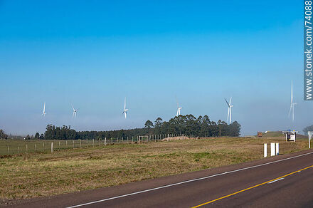 Wind turbines emerging from the morning fog near the Pampa station on Route 5. - Tacuarembo - URUGUAY. Photo #74088