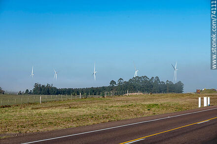 Wind turbines emerging from the morning fog near the Pampa station on Route 5. - Tacuarembo - URUGUAY. Photo #74111