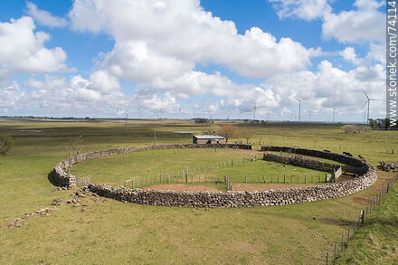 Aerial view of a large old stone corral. Archeological reserve site - Tacuarembo - URUGUAY. Photo #74114
