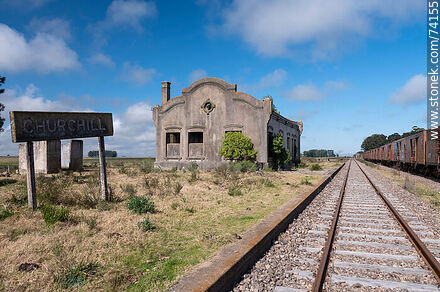 Abandoned Churchill station with its sign, tracks and old carriages - Tacuarembo - URUGUAY. Photo #74155