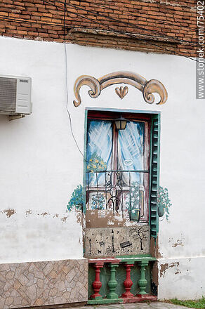 Mural on what used to be a window - Durazno - URUGUAY. Photo #75402