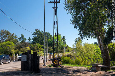 Old electrical distribution column and modern lighting column - Durazno - URUGUAY. Photo #76418