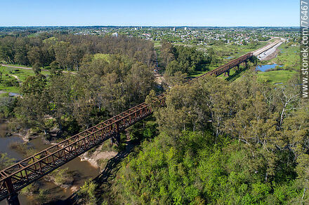 Aerial view of the iron reticulated railway bridge crossing the Yí River to Durazno City - Durazno - URUGUAY. Photo #76467