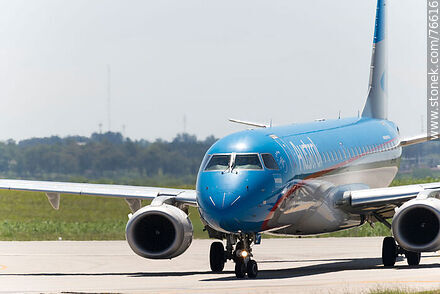 Austral Embraer 190 plane arriving at the terminal - Department of Canelones - URUGUAY. Photo #76616
