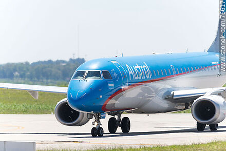 Austral Embraer 190 plane arriving at the terminal - Department of Canelones - URUGUAY. Photo #76617