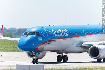 Austral Embraer 190 plane arriving at the terminal - Department of Canelones - URUGUAY. Photo #76618