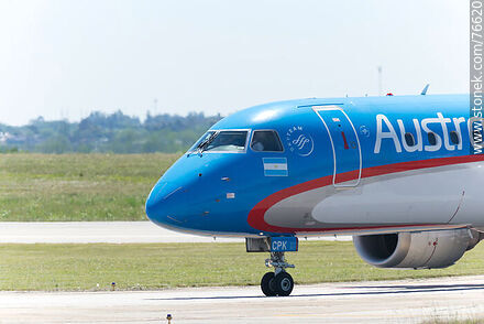 Austral Embraer 190 plane arriving at the terminal - Department of Canelones - URUGUAY. Photo #76620