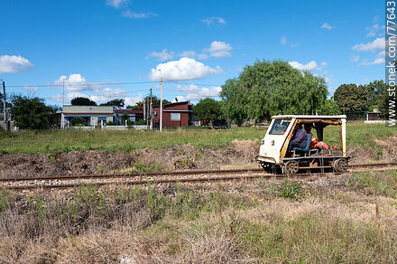 Automobile on rails rolling on the tracks - Department of Canelones - URUGUAY. Photo #77643