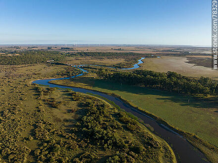 Vista aérea del arroyo San Miguel y campos cultivados - Departamento de Rocha - URUGUAY. Foto No. 78329