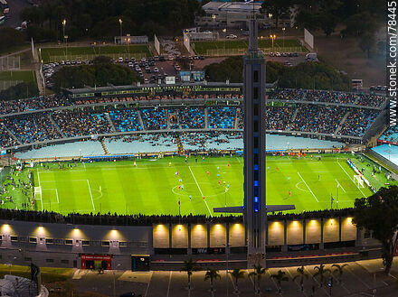 Vista aérea del Estadio Centenario iluminado al anochecer - Departamento de Montevideo - URUGUAY. Foto No. 78445