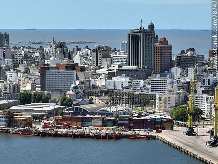 Aerial photo of the bay of Montevideo. Port pier with Lourdes church, Central Bank and Radisson Victoria Plaza in the background. - Department of Montevideo - URUGUAY. Photo #78747