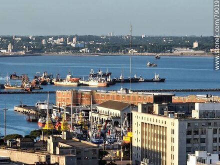 Aerial view of the naval base Teniente de Navío Carlos Machitelli and the bay with some scrap barges - Department of Montevideo - URUGUAY. Photo #79019