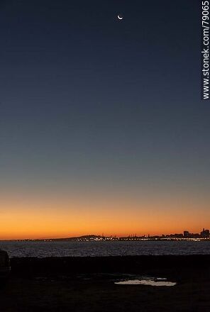 New moon far from the horizon at dusk - Department of Montevideo - URUGUAY. Photo #79065
