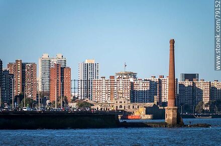 Old chimney with the backdrop of the buildings on the southern boulevard - Department of Montevideo - URUGUAY. Photo #79152
