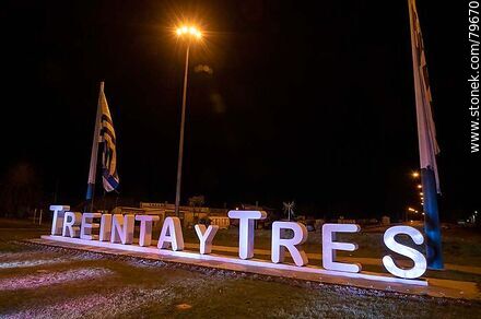 Treinta y Tres sign at night at the entrance to the city from the south on Route 8. - Department of Treinta y Tres - URUGUAY. Photo #79670