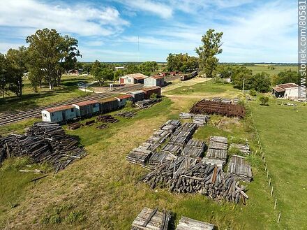 Aerial view of the Queguay train station. Old wagons, sleepers and rails - Department of Paysandú - URUGUAY. Photo #80581