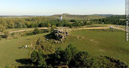 Aerial view of one of the hills of the resort with the Artigas flag - Tacuarembo - URUGUAY. Photo #80870