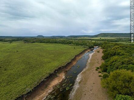 Aerial view of the El Lunarejo Valley and river - Department of Rivera - URUGUAY. Photo #81047