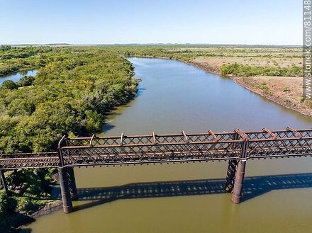 Aerial view of the old railroad bridge over the Arapey Grande River - Department of Salto - URUGUAY. Photo #81148